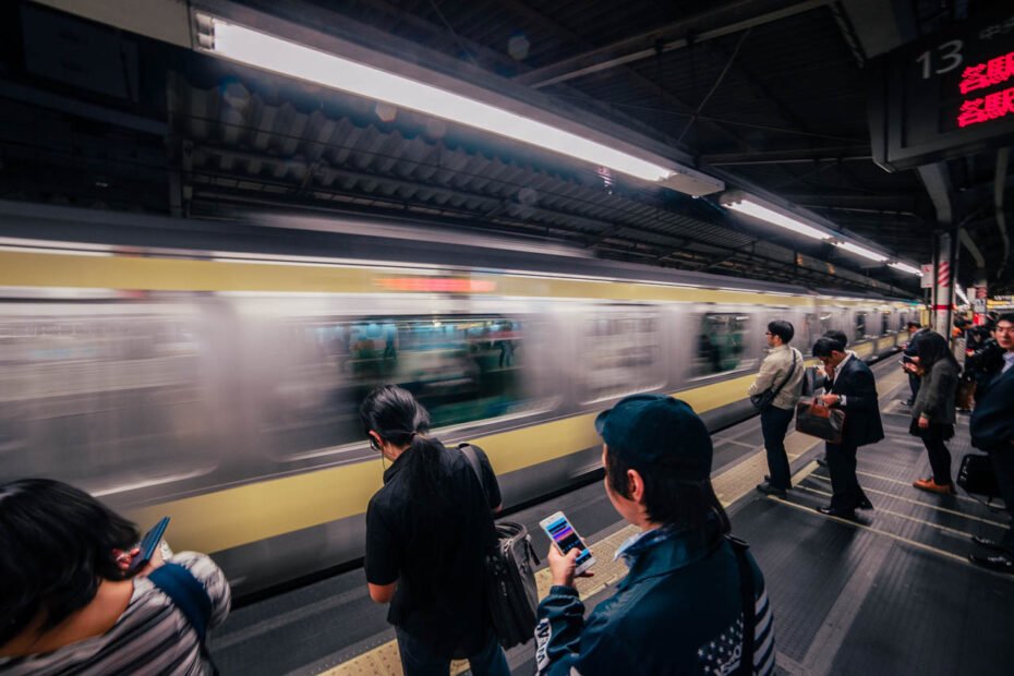 People waiting for a train in a Tokyo station